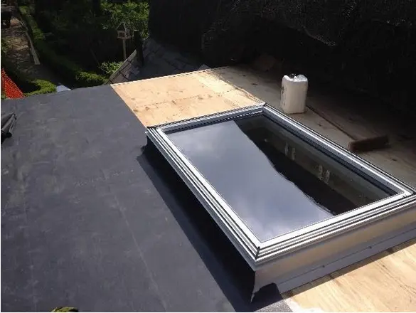 Rooflight fitted into a black EPDM flat roof